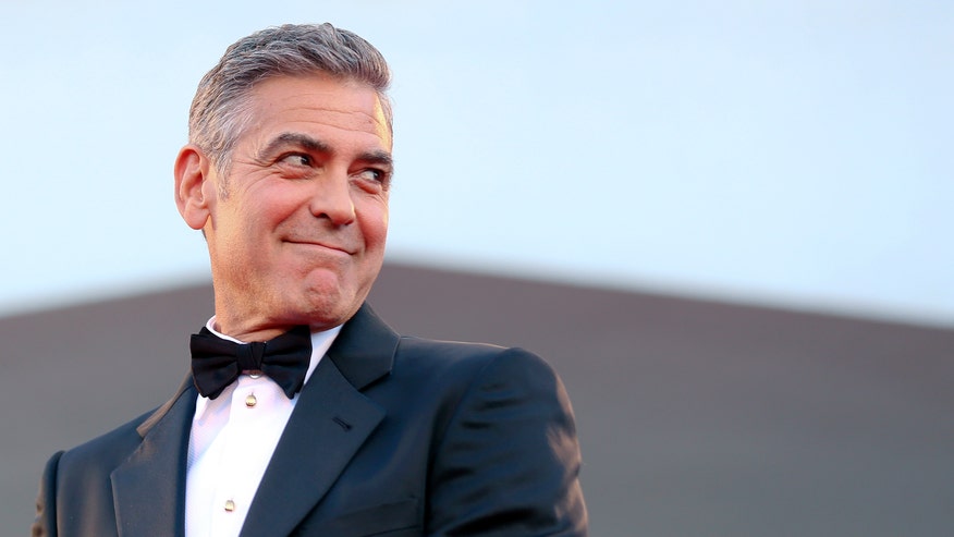 george clooney tux profile reuters.jpg